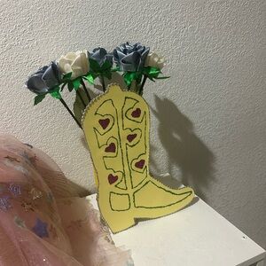 Handmade cowboy boots with flowers for decoration or party